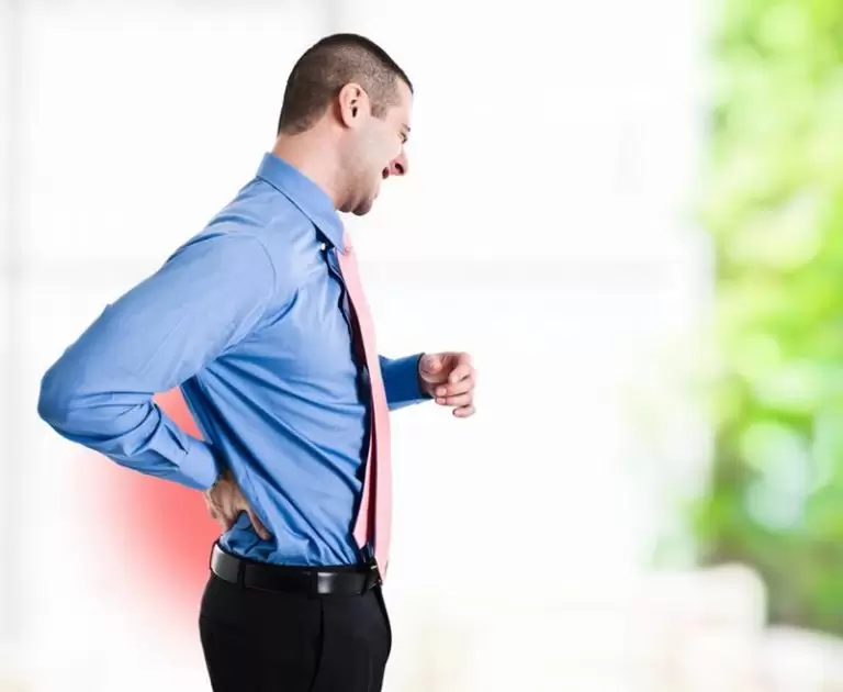 A chiropractor working with a patient