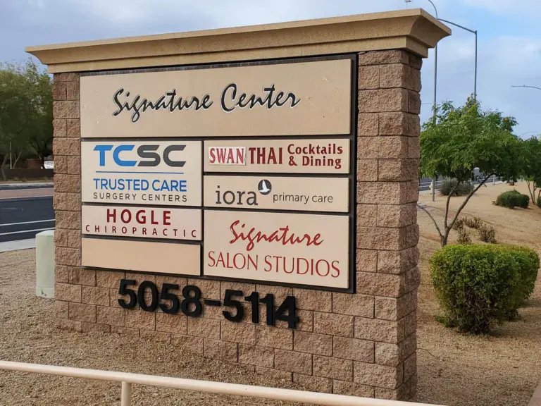The Signature Center monument sign on Southern Avenue, numbers 5058 to 5114, with the Hogle Chiropractic panel